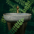 Lavabo de cerámica rectangular verde vintage con grifo